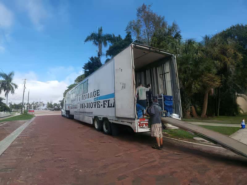 Gardiner & Sons Moving & Storage unloading truck for new Florida homeowner.